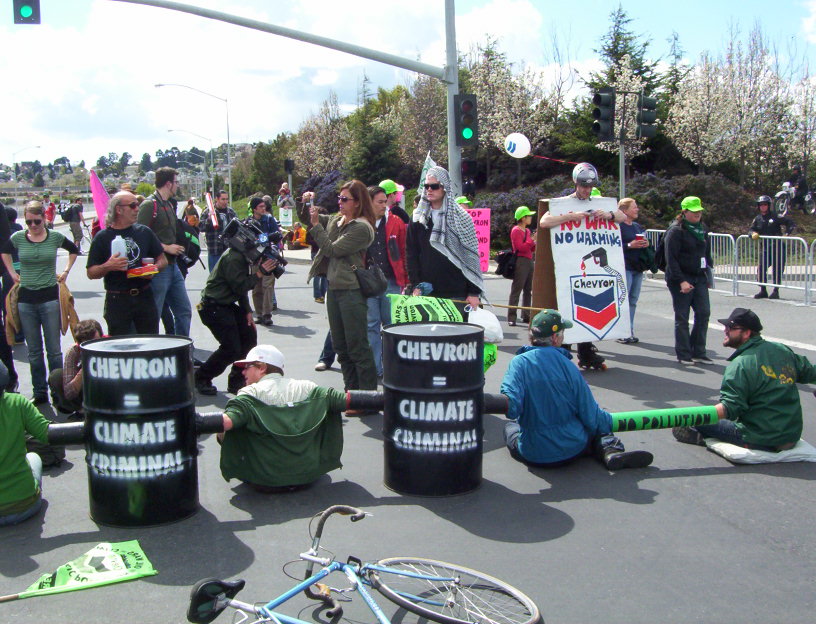 Chevron refinery lock-on barrel blockade