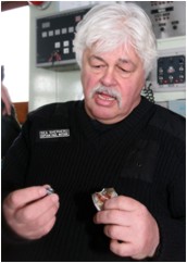 Paul Watson with bullet & bent badge