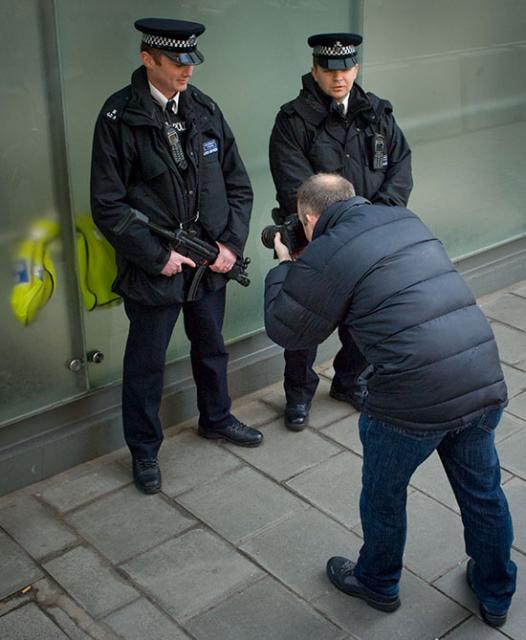 Photographing gun cops