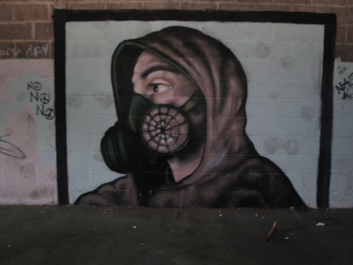 Anti-nuke gas mask graffiti at Derby protest camp