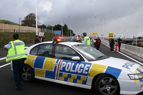 Cop car blocks road