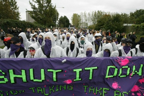 Shut it Down purple bloc banner