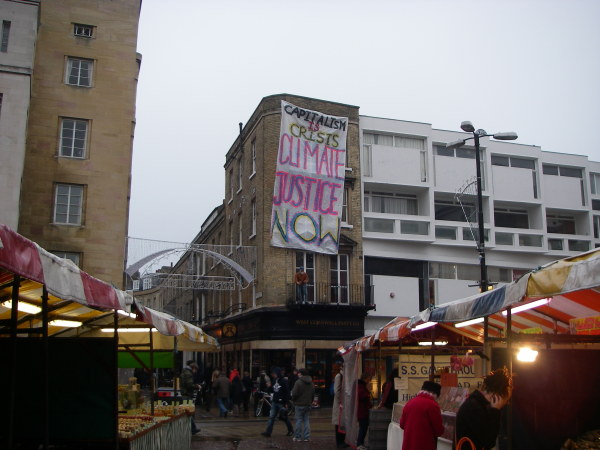 Cambridge Capitalism is Crisis COP banner