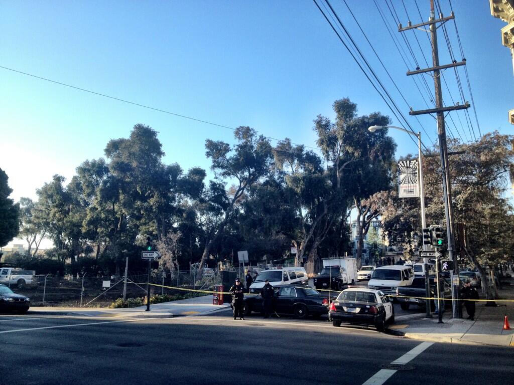 Police blocking of street in front of garden