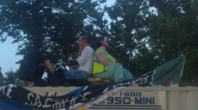 Two protesters have locked themselves together on a conex container on site