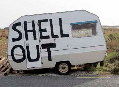 File photo of a caravan painted by campaigners from a 2011 protest 