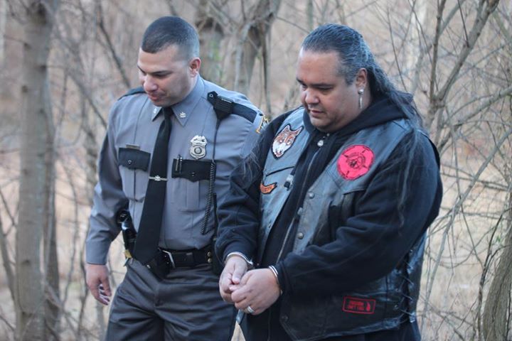 Chief Carlos Rivera of the North Arawak Tribal Nation is arrested protesting the Atlantic Sunrise pipeline in Conestoga, Pa. (courtesy of Michelle Johnsen)